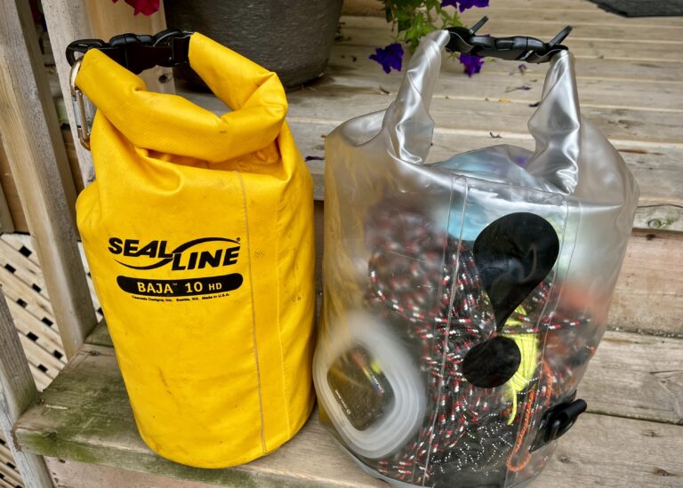 Two Dry Bags. One Yellow and one clear